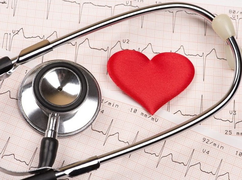 Cardiogram chart with red heart and stethoscope